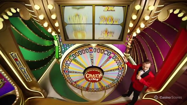 Juego tipo show en vivo con gran premio y estética llamativa.